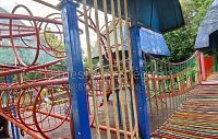Детская площадка в Дедовске: игры  за решёткой